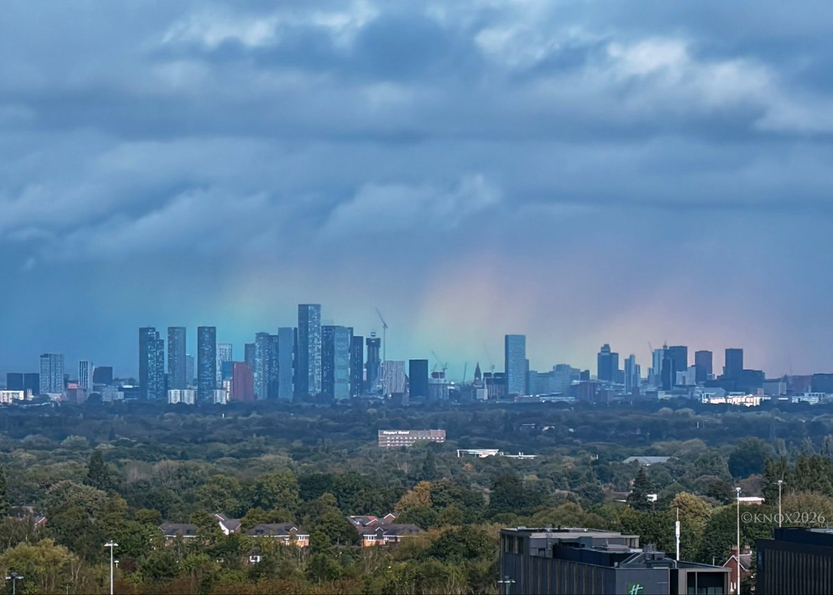 foxyknoxy99's tweet photo. Never seen this effect before…. a broad #rainbow segment giving a beautiful backdrop to Manchester City centre earlier this week. Viewed from the airport as some heavy showers passed through https://t.co/rHaqjy3ATA