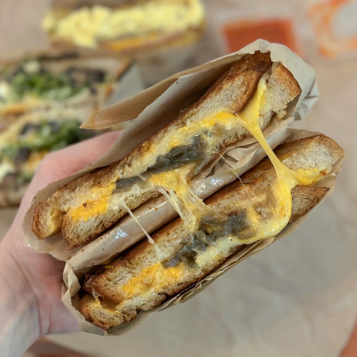 LynetteBoli5's tweet photo. I love Korio. Breakfast sandwich ($14): Greasy, dry brioche with buttery fragrance and a crisp, deep-fried-like texture, savoury luncheon meat, cheese and creamy gribiche. More dill would balance the richness. Caprese grilled cheese ($16): Rich and https://t.co/DHHLySAv5v