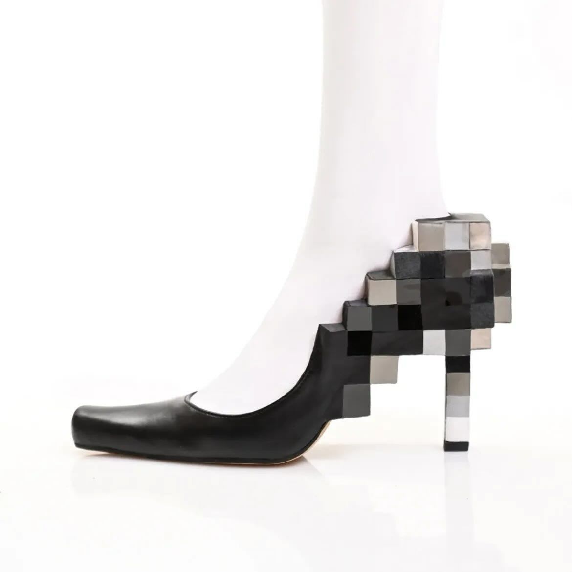 rogue's tweet photo. Kobi Levi blurred the lines between high fashion and sculpture by transforming ordinary footwear into wearable works of art https://t.co/hi4tO8rjIy