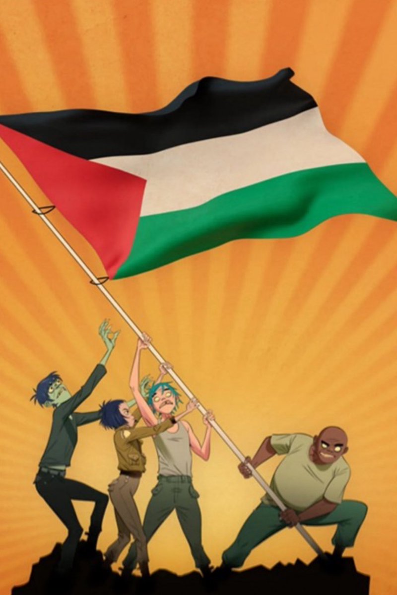 ToonHive's tweet photo. Gorillaz frontman Damon Albarn waves a Palestinian flag on stage while urging fans to speak out for Gaza:

“Don’t forget this—ever. Stand your position. Don’t ever be neutral.” https://t.co/ShJrJVhGSI