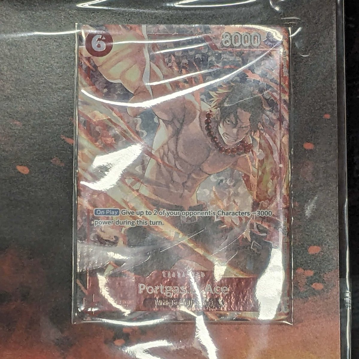 AndyCollectz's tweet photo. In-person shots of some of the OPTCG Flame Flame Fruit Exclusive Products!

-Premium Card Collection Flame-Flame Fruit Coliseum Edition
-Official Storage Box Flame-Flame Fruit Coliseum Edition
-Limited Card Sleeve Flame-Flame Fruit Coliseum Edition
-Limited Card Sleeve Standard Orange Silver