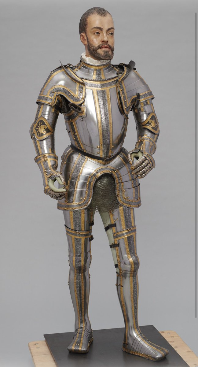 Argonaut1535's tweet photo. 🇵🇹🇪🇸🇩🇪👑Etched & Gilt Field Armor for the (Future) King Philipp II Habsburg (1527-1598) ca. 1544.

Made in Augsburg by Desiderius Helmschmied (1513-1579)

Charles V commissioned this armor from his Augsburg court armourer Desiderius Helmschmid in 1544 for his then 17-year-old son Philipp. The armour was once part of a large garniture, additional pieces of which have survived in Madrid (Real Armería, invs. A 189 et al).

In 1571, the imperial diplomat Adam of Dietrichstein journeyed to Austria, bringing with him this armour and another one made for Emperor Charles V as gifts from Philip II, King of Spain, for Archduke Ferdinand II. 

Dietrichstein was accompanying Archduke (later Emperor) Rudolf II and his younger brother Ernest, who were returning to Austria after a lengthy sojourn at the court of their uncle, Philip II.

Back in Austria there seems to have been some delay in transporting these two armours from Vienna to Innsbruck, because the following February we find Ferdinand impatiently enquiring about them. 

He asked for them to be ‘carefully packed’ (gut verpackt) and to be dispatched to Innsbruck immediately. They seem to have arrived in the spring of 1572 and were installed in the Armoury of Heroes at Ambras Castle. 

Philip’s armour was first listed in the 1583 inventory as ‘Philip II, King in Spain. 

A white cuirass with gilt and etched bands’ (Phillipus der Ander, könig in Hispnia. Ain plankher khürisz mit verguldten und göczten reifen).

Today, Philip’s armour is displayed without a helmet because whoever packed the pieces in Madrid in 1571 packed the wrong helmet. 

The helmet mistakenly dispatched to Vienna is a close burgonet (Kunsthistorisches Museum Vienna, Imperial Armoury, from the so-called Algiers Garniture made for Charles V around 1540 that also remains in Madrid.

Height: 167 cm Weight: 18 kg