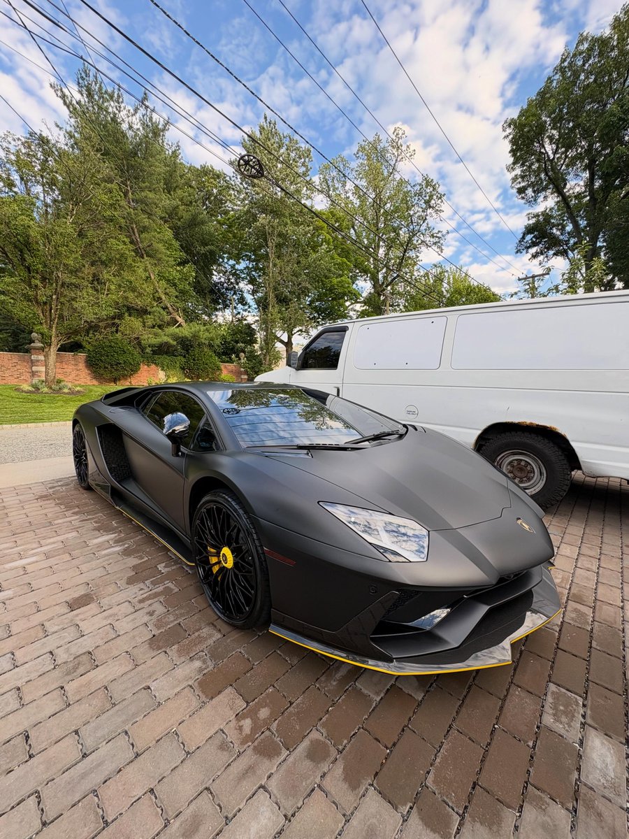 Glaucio_lsb's tweet photo. Matte black menace. This Lamborghini Aventador looks like it belongs in Gotham. Detailed by Rags2Riches Auto Spa. Call/Text: (862) 271-6302 https://t.co/L5WI7JhRx7