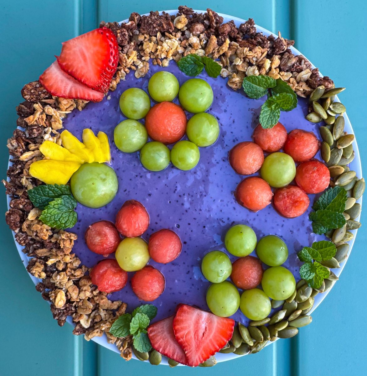 thatsrach's tweet photo. smoothie bowl Saturday🍇🍉🥭🍓 https://t.co/CwQJvaz3Gq