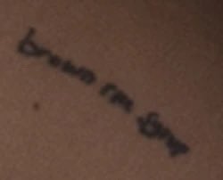 cambeserious's tweet photo. thinking about ariana’s left thigh tattoo that says ‘brown rice syrup’ https://t.co/yCL0E23Eu7