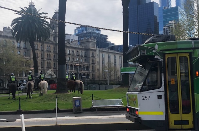 graemebowman's tweet photo. @KowalskiKit @therealrukshan This sums up Melbourne in 2026.

Iconic tram, majestic Windsor Hotel, and mounted police on standby in case ordinary aunties, mothers and grandmothers are publicly attacked by violent men. https://t.co/C0Ts3Tkuni