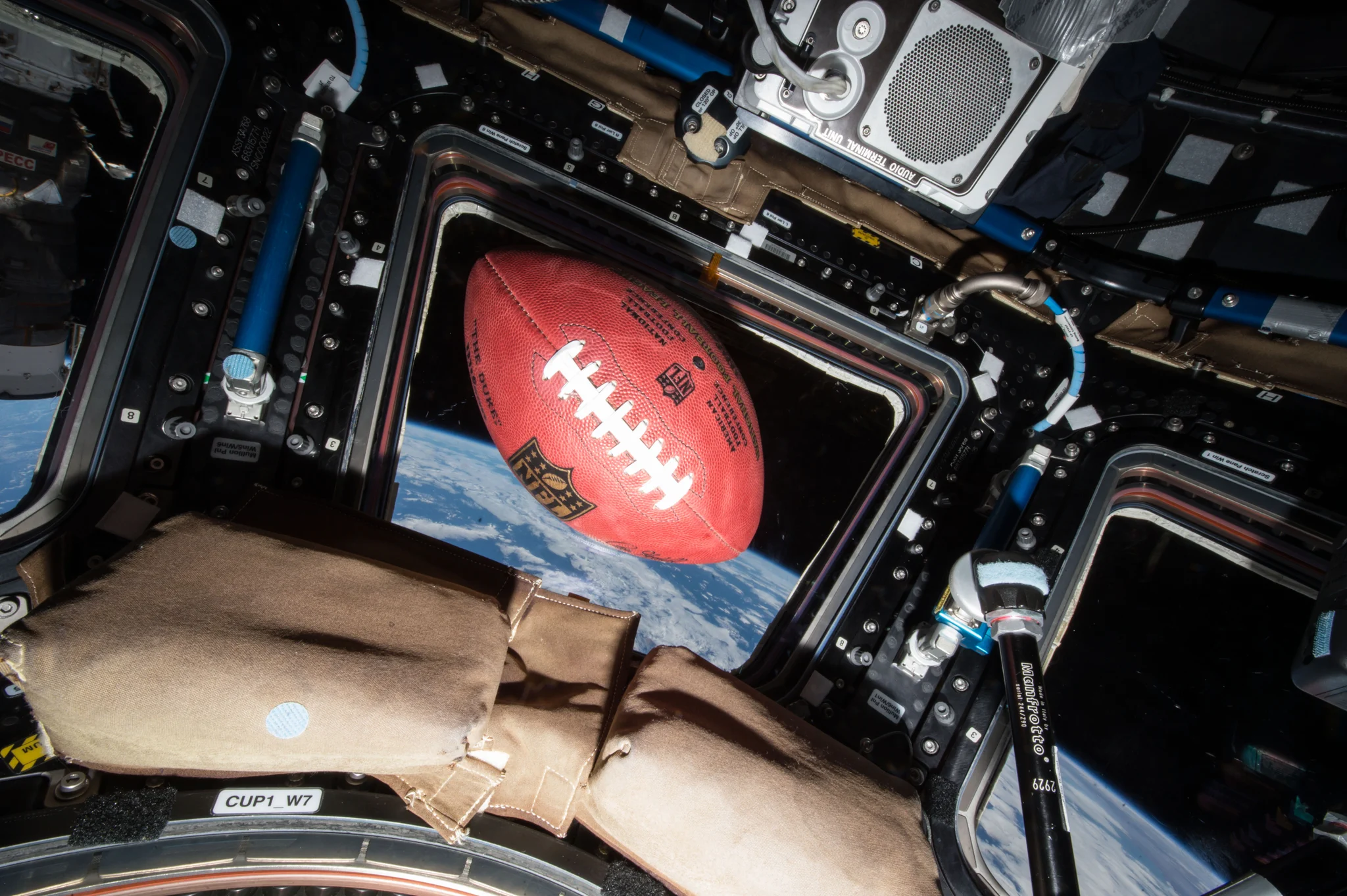 A football floats in microgravity aboard the International Space Station, high above the Earth.
Credit: NASA