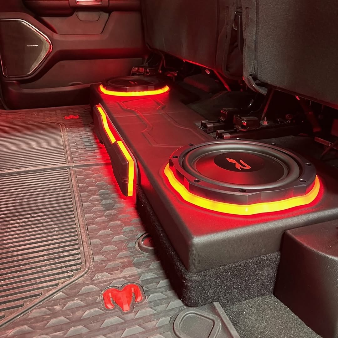 EmeraldManchini's tweet photo. Custom RAM TRX audio build: dual Alpine Type-R 10” subwoofers in a hand-fit under-seat enclosure with fiberglass, vinyl, and red LED accents. Deep, tight bass without sacrificing cabin space. Built for power, precision, and bold TRX style. https://t.co/1Ht4BidjJM