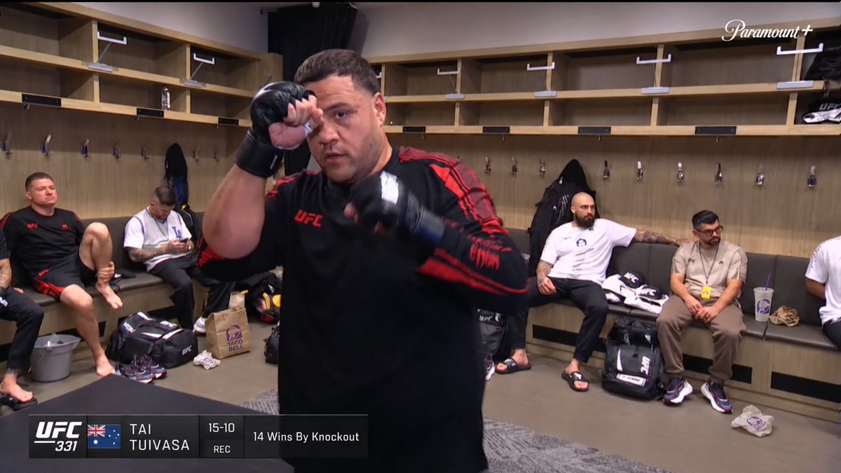 MMAJOEYC's tweet photo. AINT NO WAY TUIVASA HAS TACO BELL TRASH IN THE BACKGROUND AGAIN??? https://t.co/0M3RFLQVor