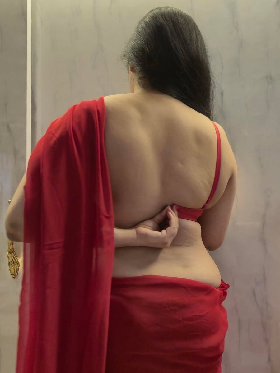 kinky_soniya's tweet photo. Red saree hanging off, bra half-undone… come grab these heavy tits from behind, squeeze them hard and shove your cock deep while I stay bent over like this. #slut #bbcaddict #whore #mistress https://t.co/YjuLq7ljtK