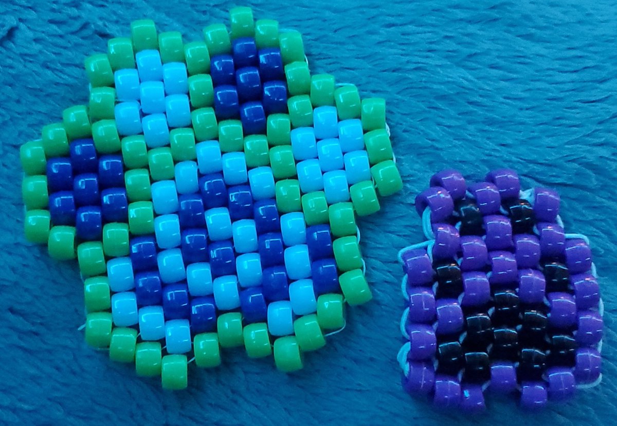 SlutM3Out_X3's tweet photo. kandi post as promised :3 (I've made so much more but lwk I kept NONE OF THEM who am i)

1. rotator cuff ! FIRST REAL KANDI I MADE!!
2. paws! the purple one was my first. it looks bad but it's such a good fidget
3. pride cuff I haven't finished (I ran outta string) https://t.co/sz6CMVj5Vm