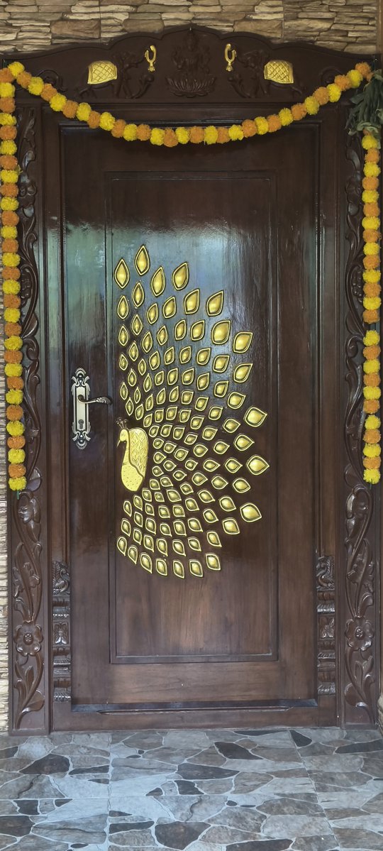 Vicky_Uncut's tweet photo. Our new home's  main door 🦚

How does it look ? https://t.co/X1VRIWN462