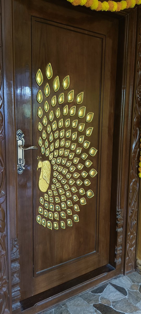 Vicky_Uncut's tweet photo. Our new home's  main door 🦚

How does it look ? https://t.co/X1VRIWN462