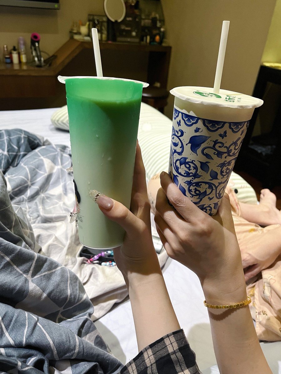 sultan_yati's tweet photo. Just stole his half of taro milk tea and he’s pretending to be grumpy… but his phone’s secretly snapping pics of me https://t.co/YXQNZ4wJFI