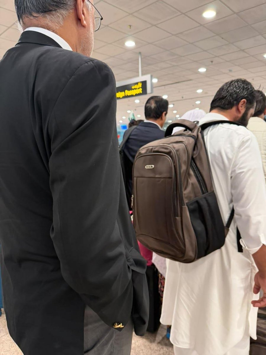 Aqqssaa12's tweet photo. @betterpakistan spotted standing in regular queue for immigration - no VIP protocol, no special lines, no cameras “curating content” ! Good to see a senior politician like Ahsan Iqbal follow the process like a regular citizen. https://t.co/s2eHbemGmE