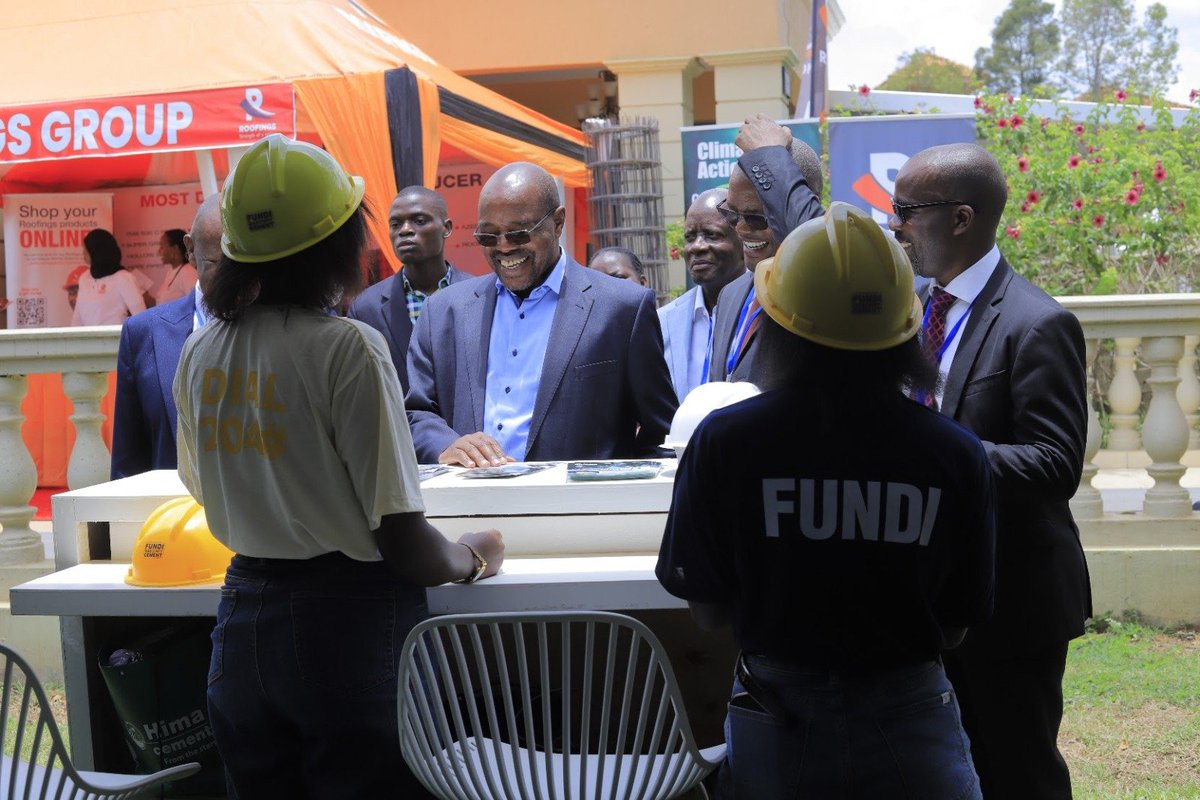 WhiteBearCOMM's tweet photo. Hon. @AmosLugoloobi, State Minister for @mofpedU (Planning), visits the #HimaCement tent at CHADA 2026, engaging with the team and discovering more about Hima’s solutions for Uganda’s construction industry. Catch @HimaCement at Lake Victoria Serena, Kigo and connect with the team https://t.co/rt03Ae0mXD