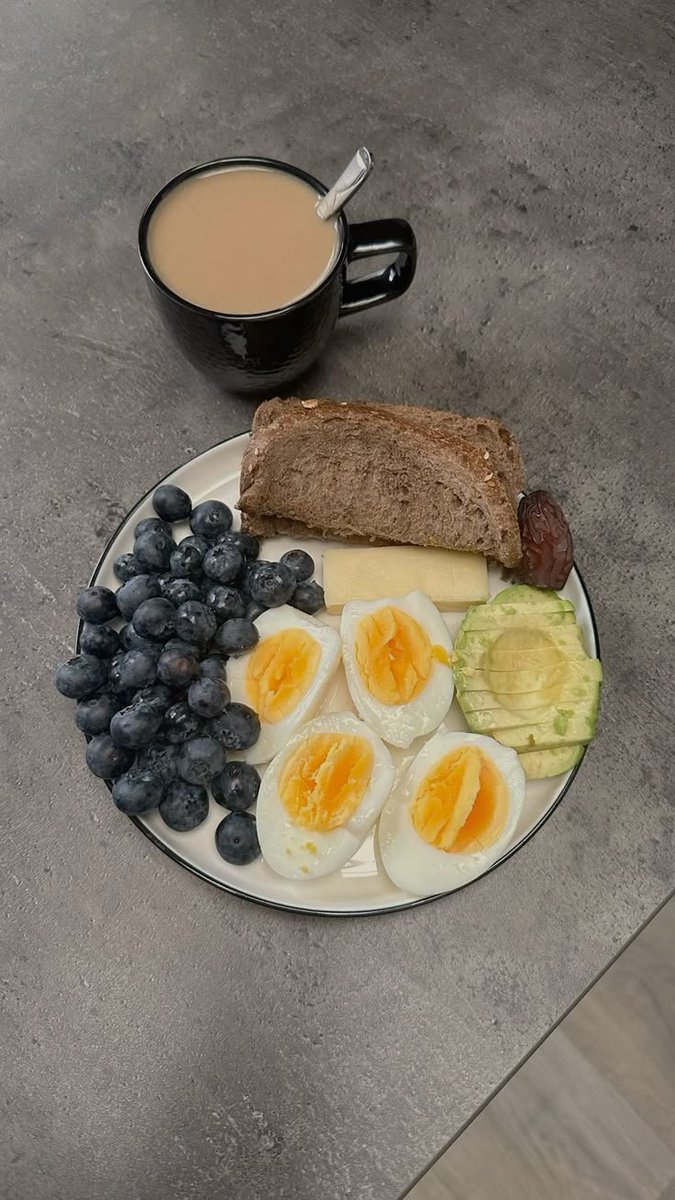 GentlemenxEra's tweet photo. A balanced morning board: jammy halved eggs, fresh berries, sliced avocado, and seeded bread. https://t.co/phs57Oxsji