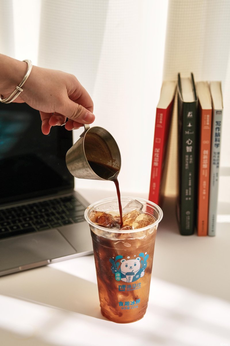 NostraMD's tweet photo. Hey, just grabbed your favorite iced latte on my way! Saw you typing away at your desk, so decided to bring this over—small win for a better workday. https://t.co/hARylj7ZBY