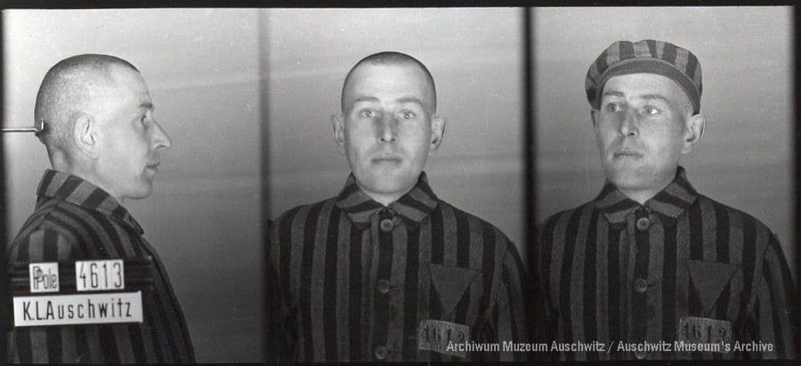 A mugshot registration photograph from Auschwitz. A man with a shaved head wearing a striped uniform photographed in three positions (profile and front with bare head and a photo with a slightly turned head with a hat on). The prisoner number is visible on a marking board on the left.