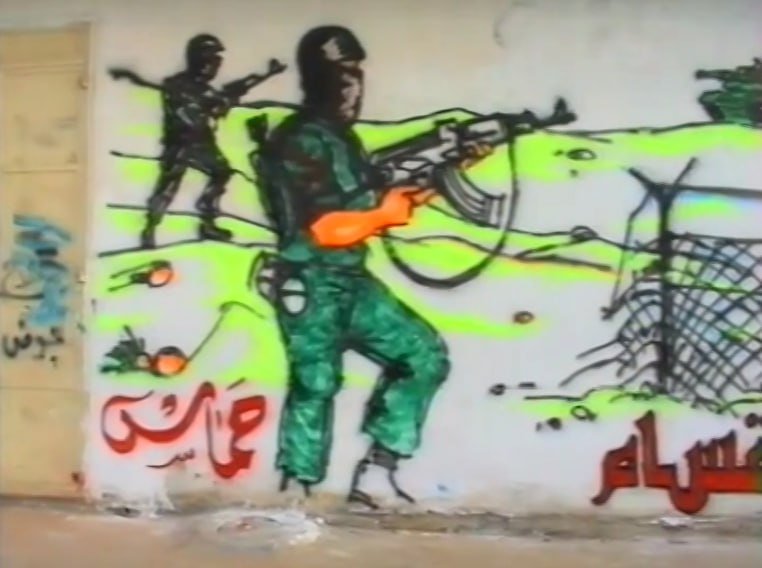 GazzaArchive's tweet photo. Gazze'nin duvarlarına çizilen El-Kassam Tugayları çizimleri.

2001 https://t.co/DHrUdcnQJT
