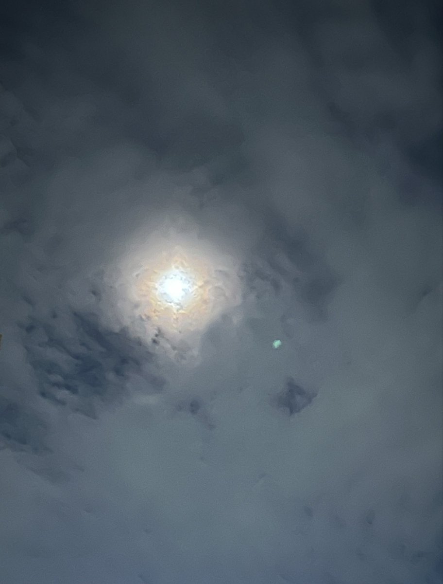 AnupamChow51153's tweet photo. The moon hides behind the clouds,
yet the world below still glows.
A quiet night, soft light,
and the sky watching in silence.

#MoonNight 
#life_is_beautiful https://t.co/xvHlOrC5wz