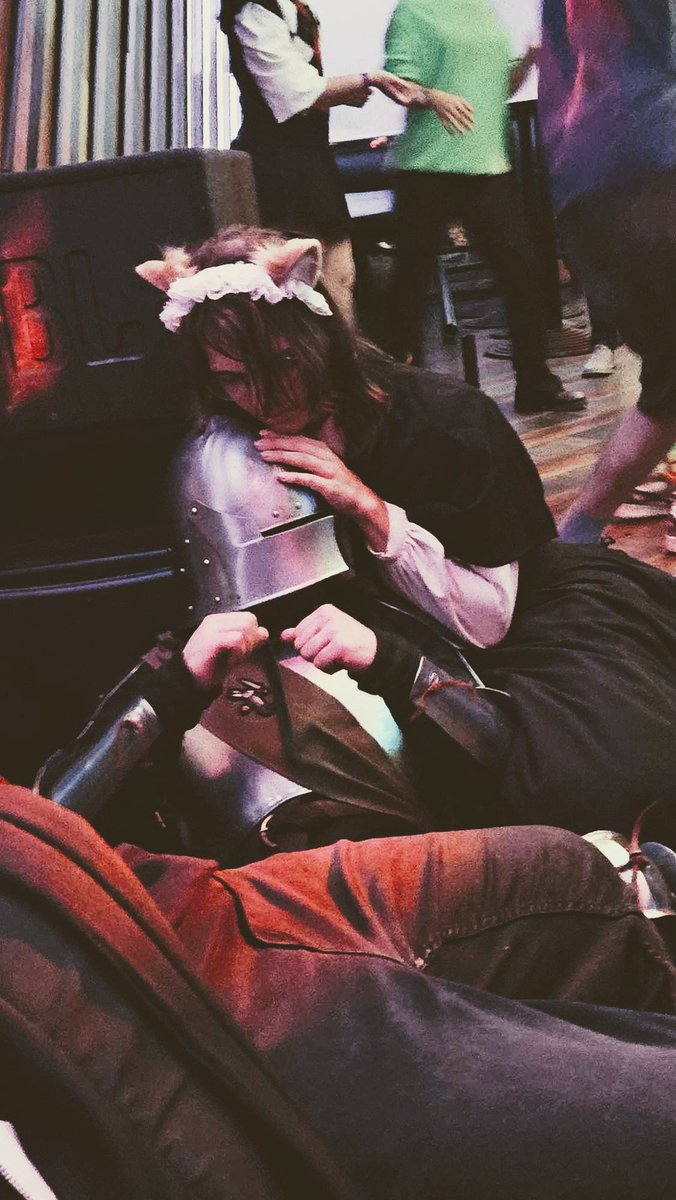 SonyaTheMaid's tweet photo. Went to a Nightcore rave and a friend of mine caught this gem of a rennaisance painting picture of me

Squire catmaid tending to the wounds (dance induced fatigue and alcohol abuse) of a fallen knight on the battlefield (the disco dance floor) https://t.co/KjFKquHMAy