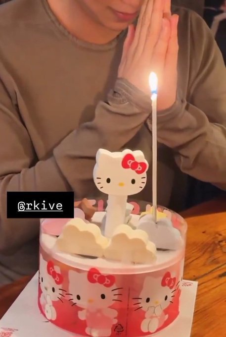 kookyun's tweet photo. It's Namjoon with his hello kitty cake and phone cover against the world https://t.co/d2GR71CQvW