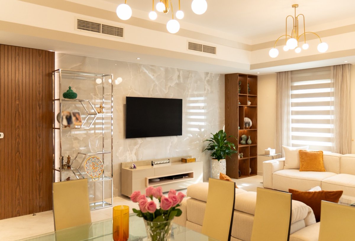 DewittFrattali's tweet photo. BEFORE &amp; AFTER

Where sophistication whispers and comfort reigns. This living room blends quiet opulence with personal warmth: a luminous porcelain wall, bespoke walnut joinery, subtle mirrors, 3D panelling, and burnt-orange accents. A thoughtful https://t.co/flgDTzylc3