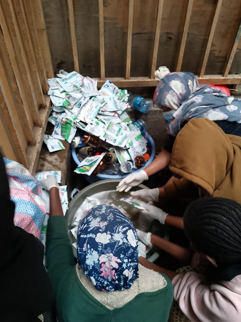 DFHRC's tweet photo. #WorldCleanupDay in action! In Pumwani Ward, Ann Itumbi &amp; the community turned non-recyclable plastic waste into durable #EcoBricks — packing cleaned plastics into bottles to divert waste from our streets and build something useful. Small actions, lasting impact. #IAmPeace https://t.co/mSsd8SkU4w