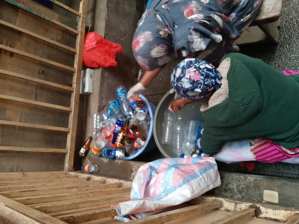 DFHRC's tweet photo. #WorldCleanupDay in action! In Pumwani Ward, Ann Itumbi &amp; the community turned non-recyclable plastic waste into durable #EcoBricks — packing cleaned plastics into bottles to divert waste from our streets and build something useful. Small actions, lasting impact. #IAmPeace https://t.co/mSsd8SkU4w