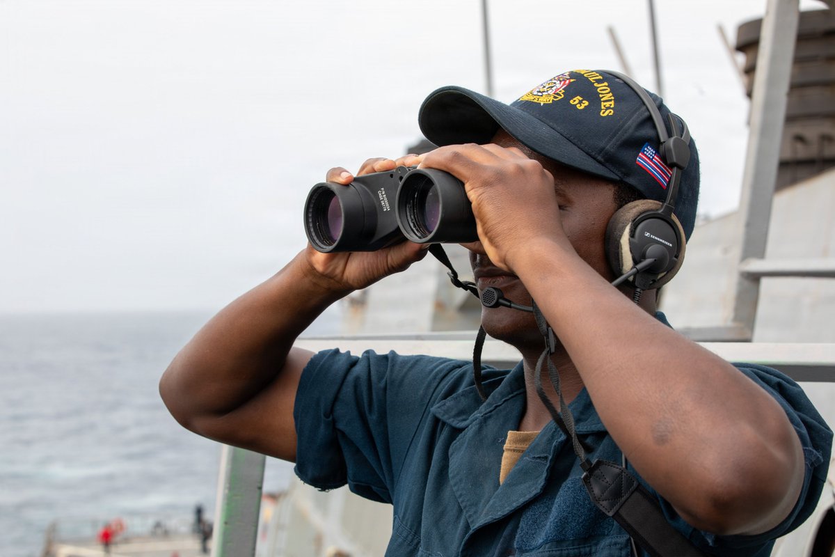 CENTCOM's tweet photo. A U.S. Sailor stands watch aboard USS John Paul Jones (DDG 53). As of Sept. 20, CENTCOM forces have redirected 109 commercial vessels to ensure total compliance.