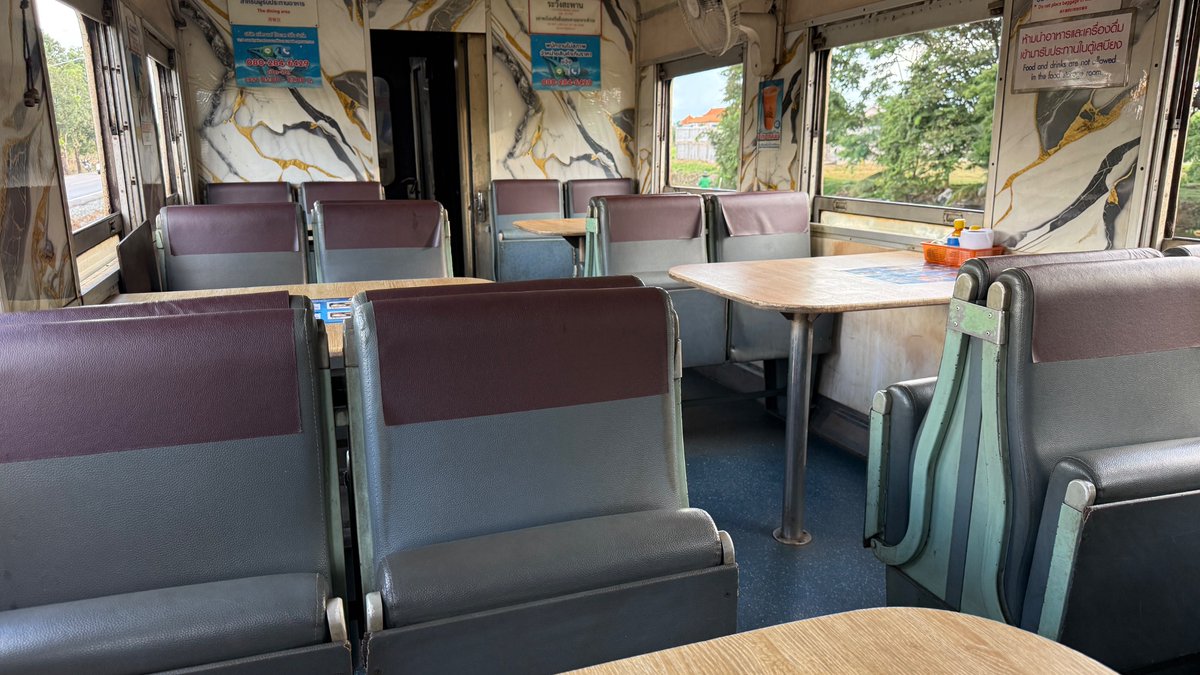 ThaiTrainGuide's tweet photo. 🚆 Good evening from Special Express No. 14 from Chiang Mai to Bangkok. Another day, another sleeper train.

For the journey home, I’m reviewing the 1st Class sleeper cabin. This is a different type of carriage from the one I reviewed on my recent trip from Trang, so it will be interesting to compare the two.

I’m also trying something different tonight. This time my berth has me travelling with my back to the locomotive. I want to see whether that makes any difference to how comfortably I sleep, particularly with the movement of the train during the night.

For now, I’m in the dining car having a light snack: freshly cooked spring rolls, watermelon, and a nice cold Iced Thai Tea. 

I’ll retire to my cabin once the sun has gone down. Judging by the sky, we might be treated to a good sunset from the train tonight.

Then hopefully a good night’s sleep as we make our way south to Bangkok. Full review coming soon on Thai Tracks. 

#ThailandByRail #ThaiTracks #ThaiTrainGuide #RailTourism #Thailand #ChiangMai #Bangkok #SleeperTrain #TrainTravel #รถไฟไทย #นั่งรถไฟเที่ยวไทย