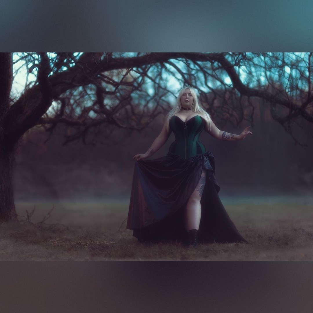 WERITOhdez's tweet photo. The mist grew thicker and thicker, and we seemed to be drifting into a world of silence and shadow. ” Gorgeous Gloria Blaze in my green-and-black gored corset, photographed by Sax Kjaer at The Corsetry Retreat. A week of immersive corsetry and https://t.co/NScmjwwsnJ