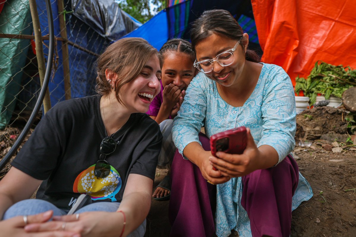 WCKitchen's tweet photo. For WCK, connecting with the communities we serve goes beyond familiar cuisine. When our #ChefsForNepal teams delivered meals in Galaudey, southwest of Bidur, we met Kusum and her daughter, who were displaced by the floods. They love to dance, and they showed WCK’s Karen videos of Nepali songs, dances, and their recitals so she could learn and dance with them. Just like food, dance brings people together to share culture, tradition, and joy.