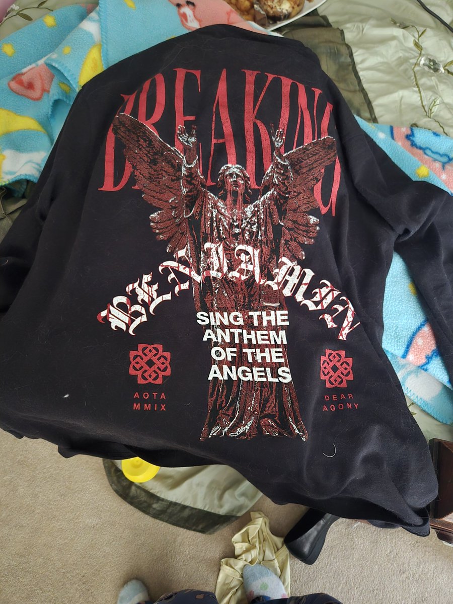 Sug3rynyan's tweet photo. Before we go for a bit I did wanna show the merch haul from the concert !! Best shirts ever. The album phobia is our favorite so we're entirely pleased about this. And the first one came in long sleeve and short sleeve but the long sleeve had this badass shit on the back. We love angel and fallen angel idolitry (BECAUSE of bb) so naturally we had to get it. And ofc (below) what well never shut up about forever.