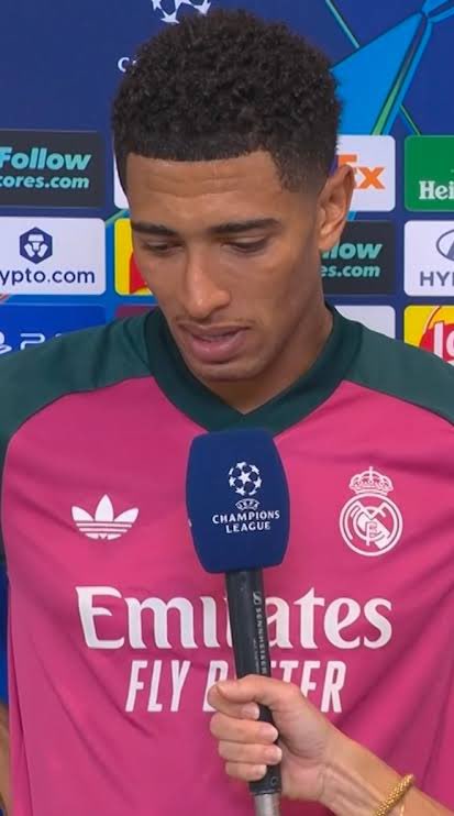 UTD_Seth001's tweet photo. 🚨Jude Bellingham on his altercation with Giuliano Simeone during Real Madrid’s 2-1 defeat to Atlético Madrid:

🎙️ Reporter: “Jude, what happened between you and Giuliano Simeone?”

🗣️ Jude Bellingham: “Álvarez miscontrolled the ball and I went in for the challenge. I got the ball cleanly, I didn’t touch Álvarez, and somehow he goes down and I get a yellow card.

“I went over to the referee because I wanted an explanation. I’m frustrated, it’s a derby, emotions are high.

“Then Giuliano comes right into my face and says, ‘Keep crying. That’s all you can do now, cry.’

“I looked at him and said, ‘You’re nothing without Messi for Argentina.’

“He didn’t like that one.

“But I just found it funny that he wanted to get into an argument with me after coming over to provoke me.

“Look, he plays for Atlético, I respect that. But if you’re going to come into my face and start talking, don’t expect me to stand there quietly.

“I told him, ‘You’ve spent your career here and you’re still trying to prove yourself to your father, so maybe focus on the game.’

“I’m not going to pretend I was calm. I wasn’t.

“But at the end of the day, I’d rather answer on the pitch.

“We lost the game tonight, and that hurts more than anything Giuliano said.

“Next time, we’ll settle it.”