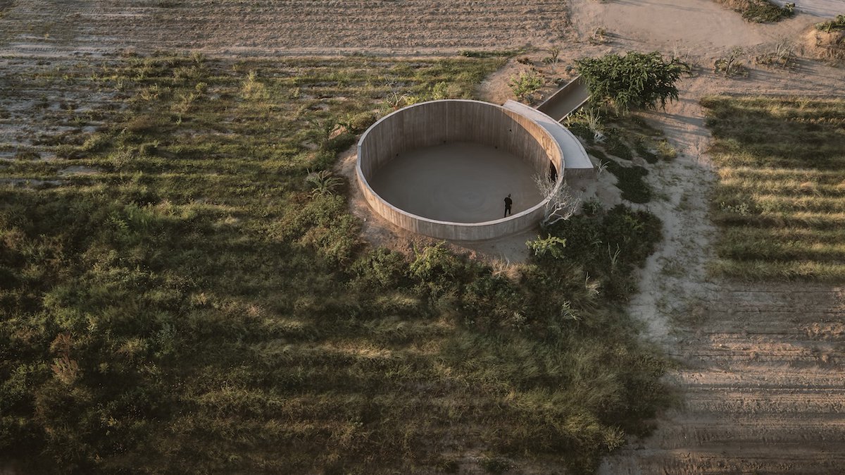 Architizer's tweet photo. #ProjectOfTheDay: Spiritual Enclosure by Ruben Valdez Practice
Set within the desert of Todos Santos, this intimate ceremony space is partially buried in the terrain and left open to the sky. Its circular walls frame the surrounding mountains and changing light, while a single angled entrance gradually reveals the space within.
📍Todos Santos, Mexico #ArchitizerAwards
Details: https://t.co/5AYUY0aaVJ