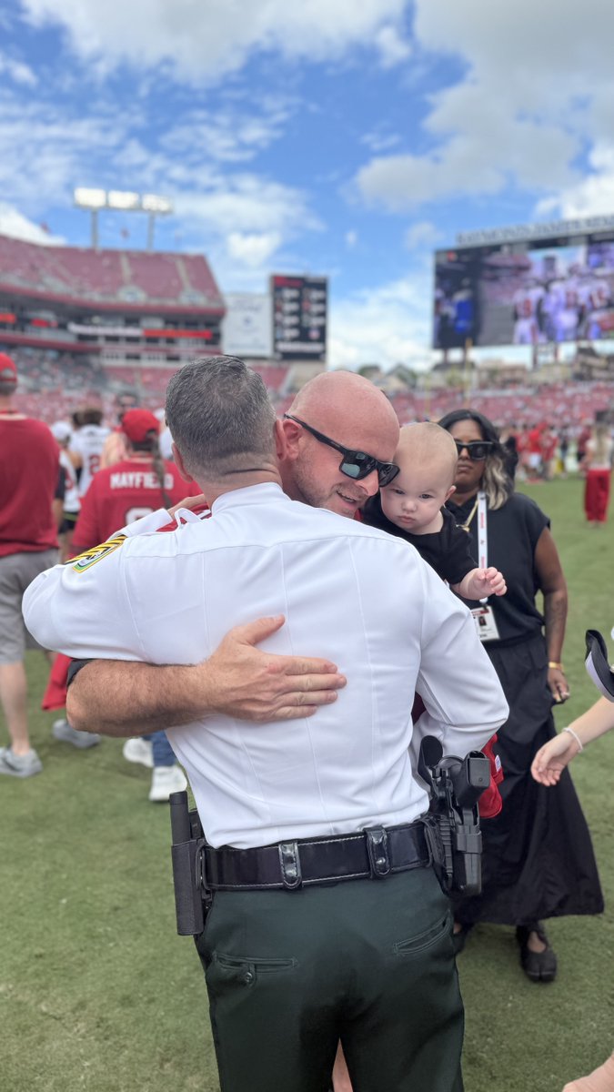 HCSOSheriff's tweet photo. Today, Deputy Muon, Deputy Daniels, Master Sergeant Bashner, and other members of #teamHCSO are at the Tampa Bay Buccaneers’ home opener. These deputies were involved in the July 16 deputy-involved shooting, and we are grateful to the Buccaneers for welcoming them and for their continued support! Thank you for standing with those who serve our community.