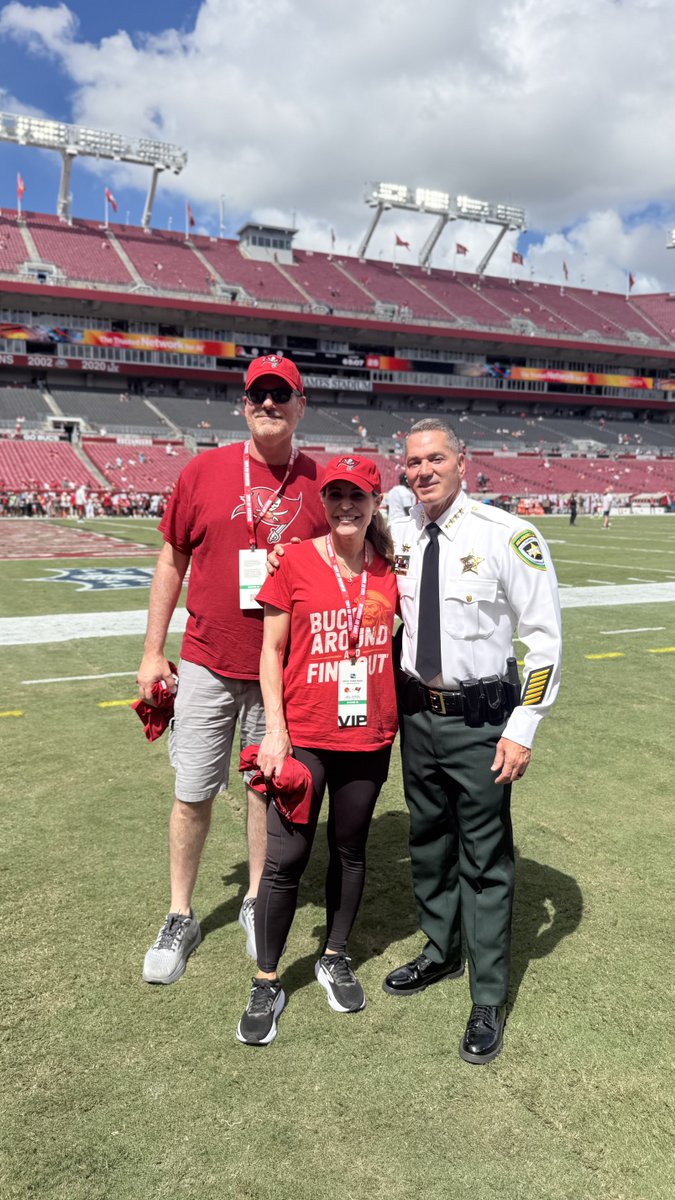 HCSOSheriff's tweet photo. Today, Deputy Muon, Deputy Daniels, Master Sergeant Bashner, and other members of #teamHCSO are at the Tampa Bay Buccaneers’ home opener. These deputies were involved in the July 16 deputy-involved shooting, and we are grateful to the Buccaneers for welcoming them and for their continued support! Thank you for standing with those who serve our community.