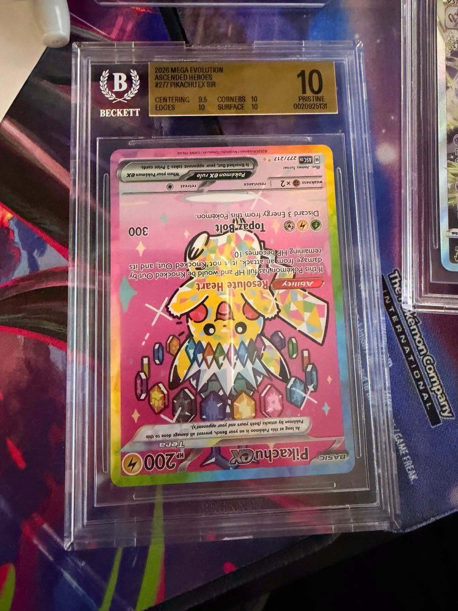 WeLovePokemon's tweet photo. You get your card back from Beckett and it looks like this, would you be happy or annoyed? https://t.co/MfVs6nvqAS