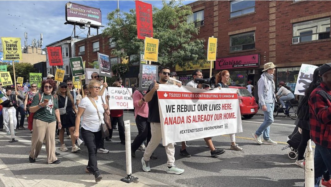 OzgulToprakEray's tweet photo. Sometimes the heaviest burdens are carried together. When hope walks the streets, it leaves an imprint no barrier can erase. Standing for what's right. 
#StatusForAll #ExtendTS2023 #MigrantJustice @LenaDiabMP @MarkCarney https://t.co/I2LtYDSw6t