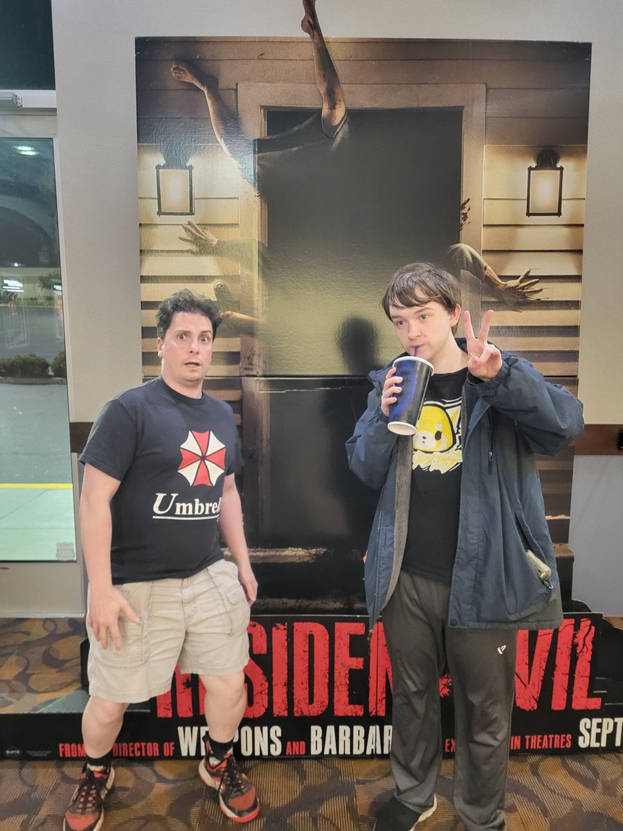 HorrorAddictsTV's tweet photo. We Saw Resident Evil last Friday!  It was awesome.  🧟‍♂️ 
I dunno... T-Rex with a witch hat is pretty cool. https://t.co/rb7JuOfkhd