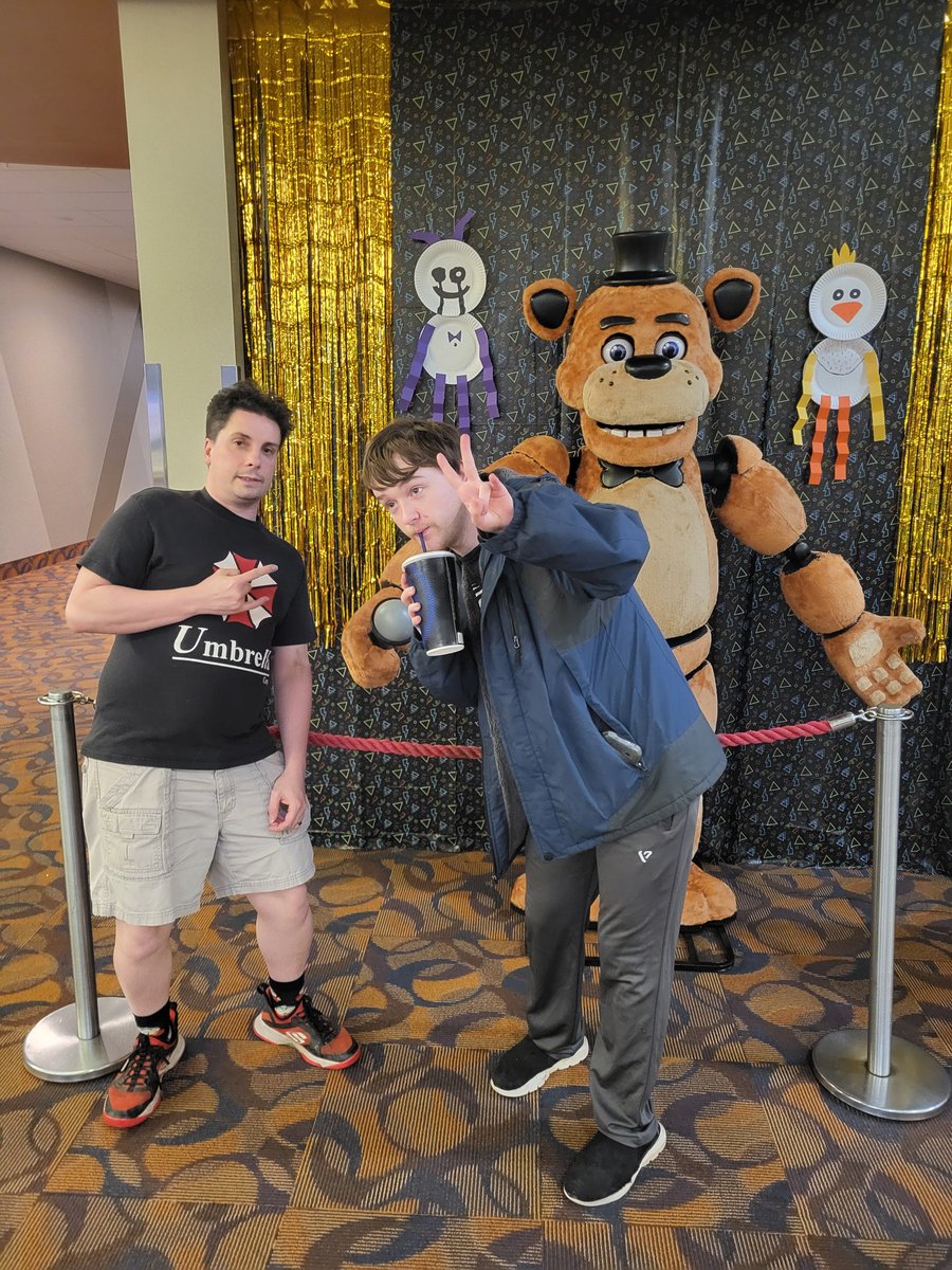 HorrorAddictsTV's tweet photo. We Saw Resident Evil last Friday!  It was awesome.  🧟‍♂️ 
I dunno... T-Rex with a witch hat is pretty cool. https://t.co/rb7JuOfkhd