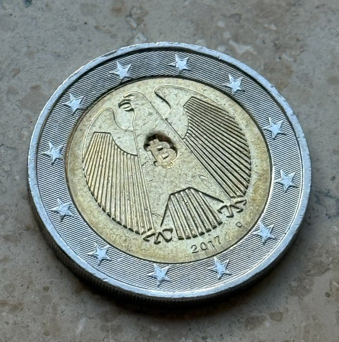 Pleb_Style's tweet photo. BREAKING: Bitcoiners in Europe are stamping Euro coins with Bitcoin stamps! 🔨💥 https://t.co/JZmc3BZVsJ