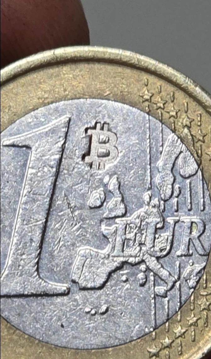 Pleb_Style's tweet photo. BREAKING: Bitcoiners in Europe are stamping Euro coins with Bitcoin stamps! 🔨💥 https://t.co/JZmc3BZVsJ