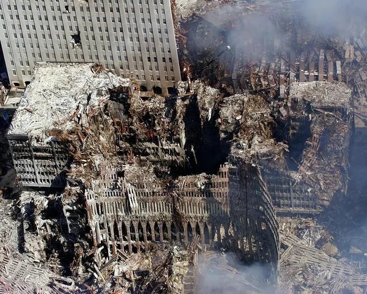 HistoryCalendar's tweet photo. The remains of the World Trade Center six days after the attacks. https://t.co/Qpq7H89cbs