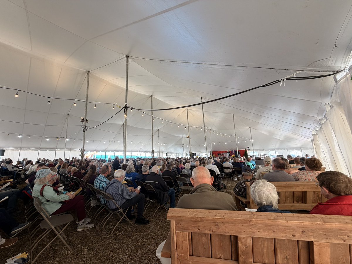 Steven_Travale's tweet photo. The calm before the storm...coming together in prayer and song before the big week officially gets underway! 

Joined with hundreds of worshippers for the worship service on the IPM grounds this afternoon.

Beautiful music, blessing of the plow, scripture readings and fellowship! https://t.co/bqQQifA5g7