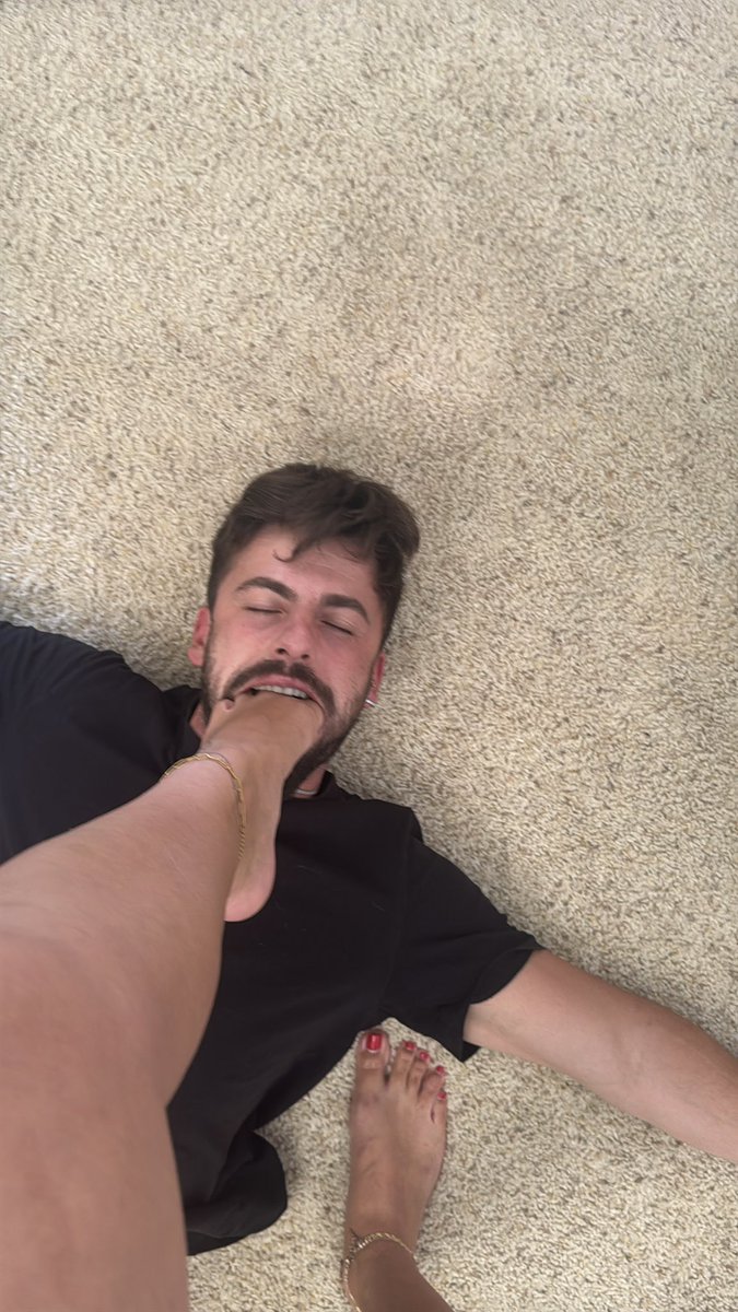 SpoiledSab's tweet photo. making him taste my red nail polish https://t.co/pvCfSzylC1