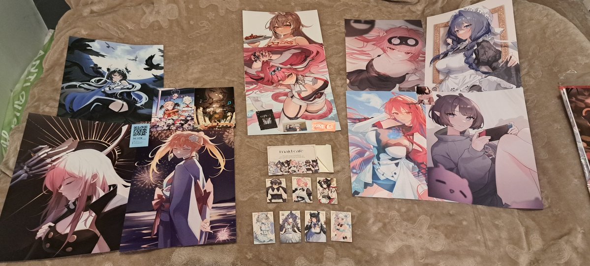 SirNinjaHusky's tweet photo. My merch haul for Vexpo 2026, minus a few NSFW things. #vexpo #hololive #nimi https://t.co/HoYfh7F5W1
