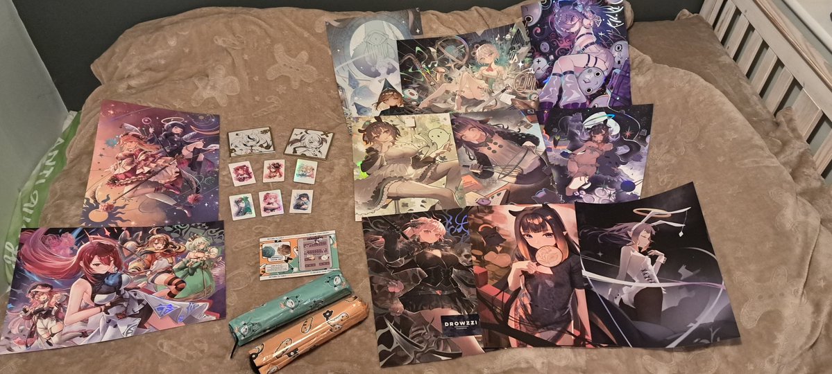SirNinjaHusky's tweet photo. My merch haul for Vexpo 2026, minus a few NSFW things. #vexpo #hololive #nimi https://t.co/HoYfh7F5W1